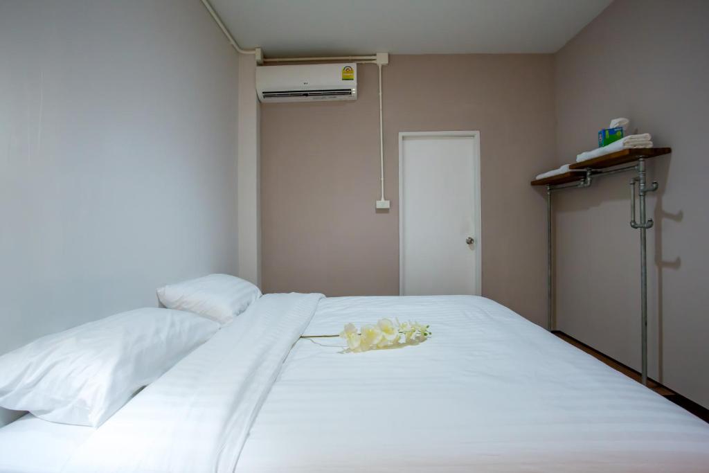 Postel nebo postele na pokoji v ubytování First Residence
