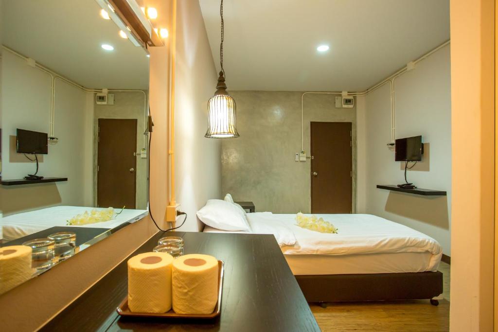 Postel nebo postele na pokoji v ubytování First Residence