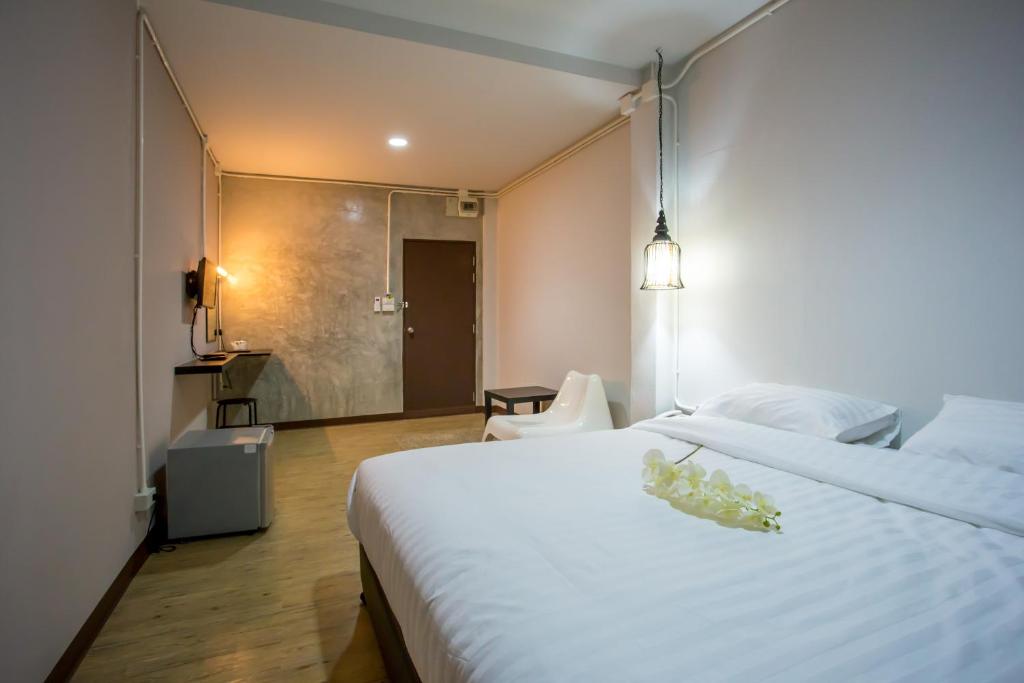 Postel nebo postele na pokoji v ubytování First Residence