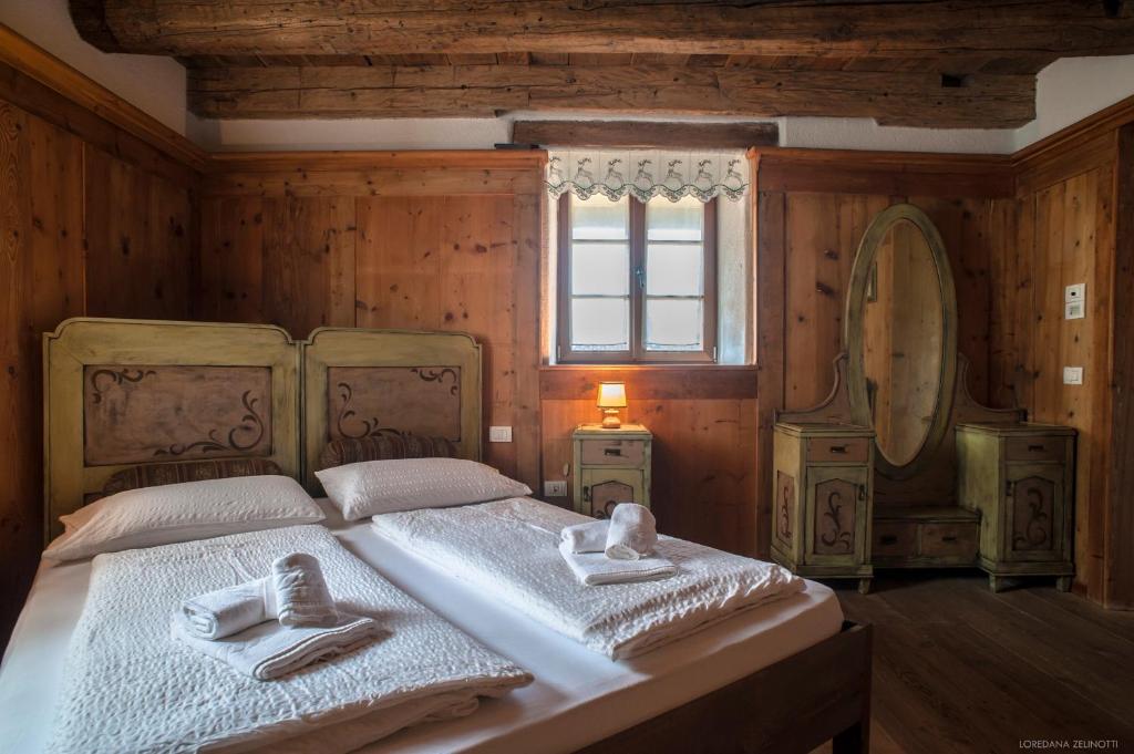 Postel nebo postele na pokoji v ubytování Maso Franceschella