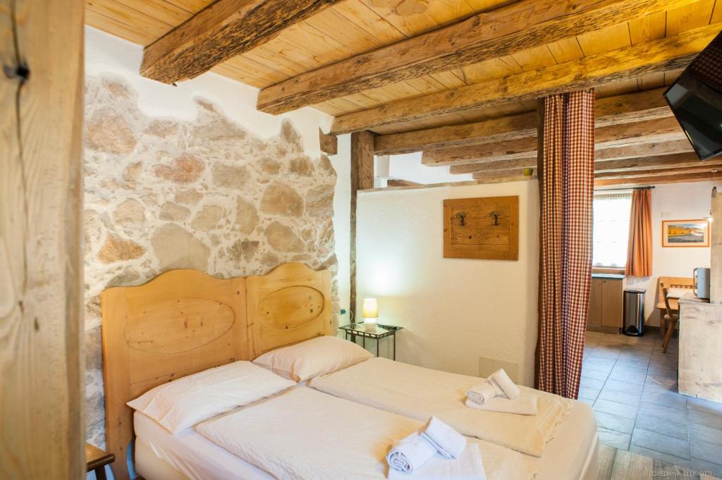 Postel nebo postele na pokoji v ubytování Maso Franceschella