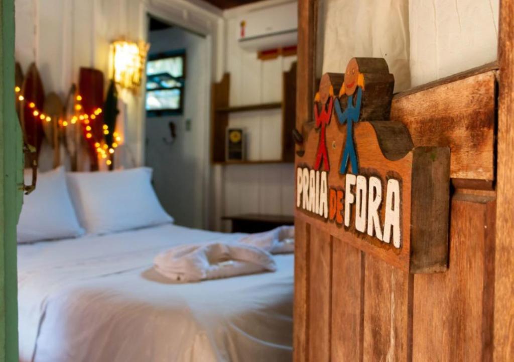 Cama ou camas em um quarto em Pousada das Meninas