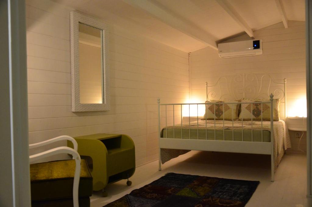 Postel nebo postele na pokoji v ubytování Lukkies Lodge Cirali
