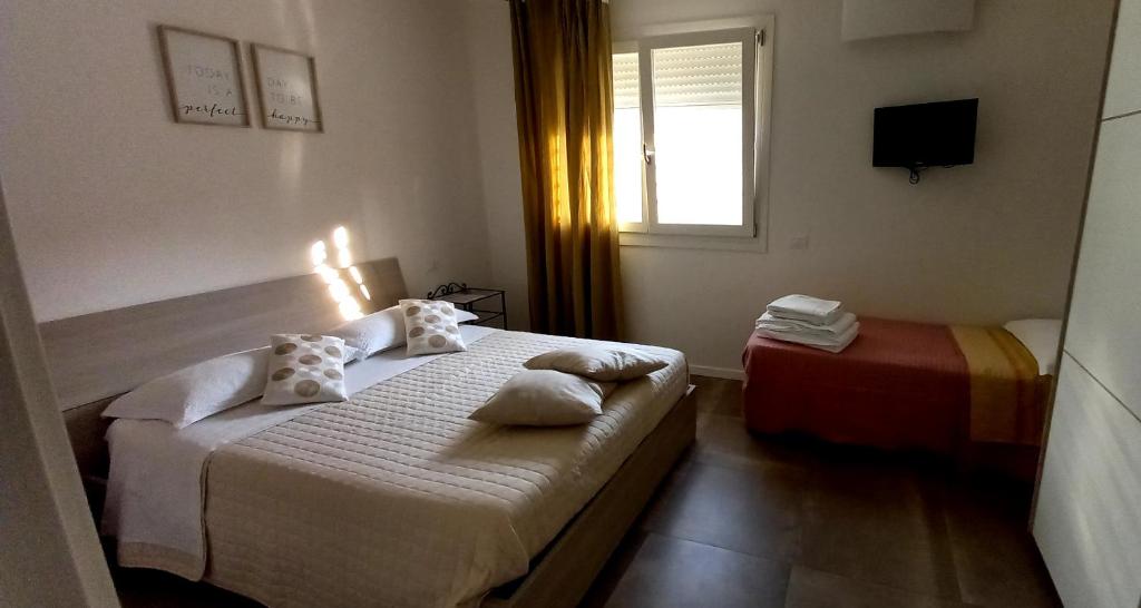 Postel nebo postele na pokoji v ubytování Maisonette Modena Park