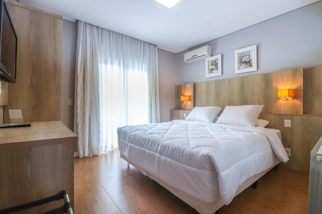 Postel nebo postele na pokoji v ubytování Pousada Bella Viena