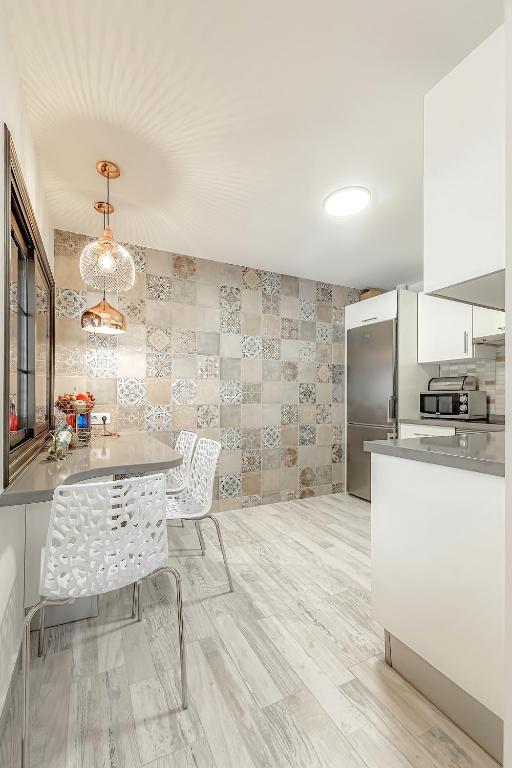 A kitchen or kitchenette at Apartment Orlando Wave