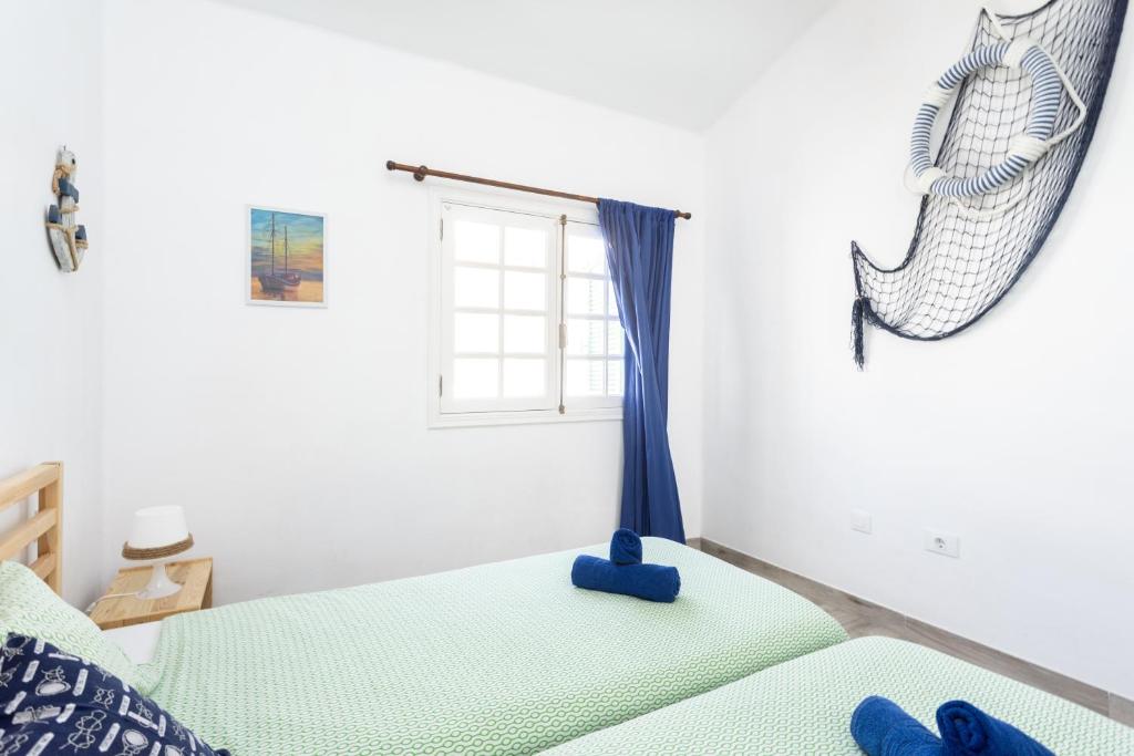 Posteľ alebo postele v izbe v ubytovaní Duplex en Residencial Balancón