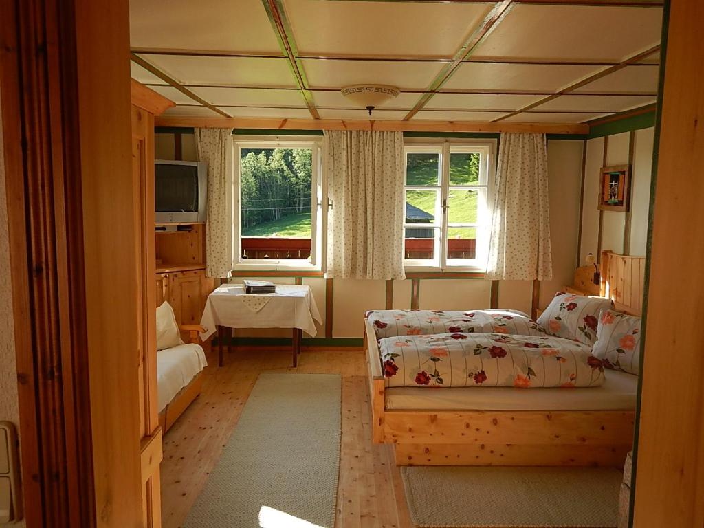 Postel nebo postele na pokoji v ubytování Bauernhof Pergila
