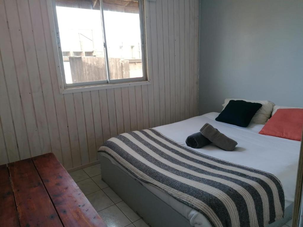 Letto o letti in una camera di Sudeste Hostel