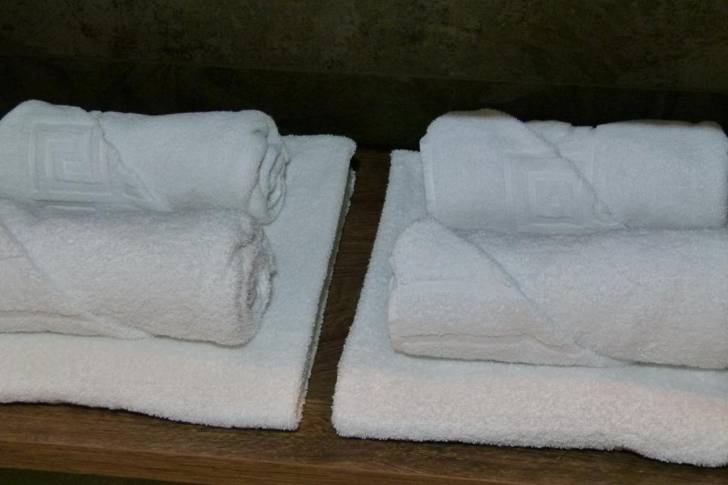 Postel nebo postele na pokoji v ubytování Hotel Grüne Elster