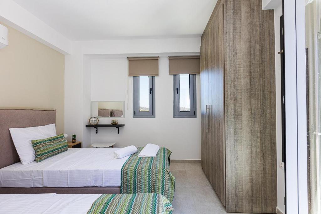 Postel nebo postele na pokoji v ubytování Villa Zoe , south Crete , Triopetra