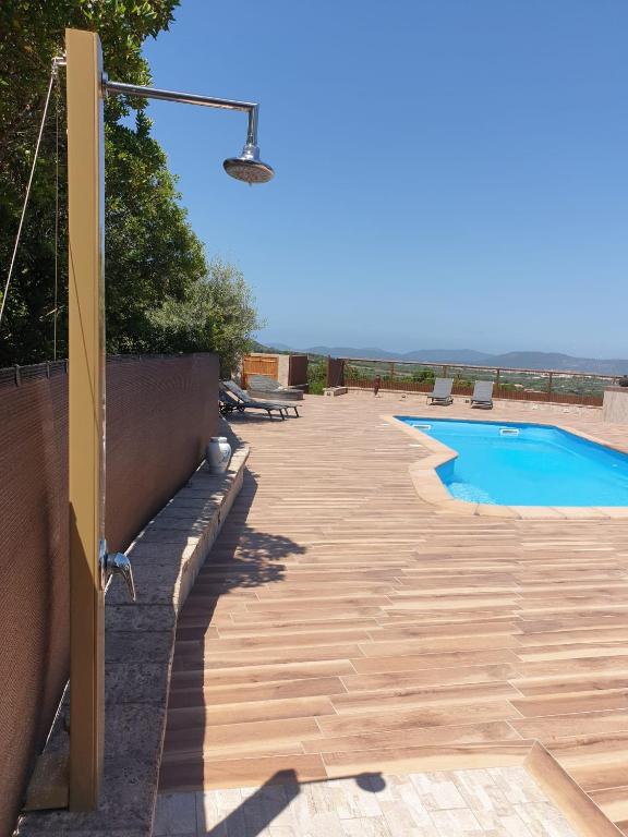 Bazén v ubytování Villa Luna e' Pedra - Suite in Villa con Vista sulla Baia di Alghero e Piscina nebo v jeho okolí