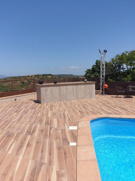 Bazén v ubytování Villa Luna e' Pedra - Suite in Villa con Vista sulla Baia di Alghero e Piscina nebo v jeho okolí
