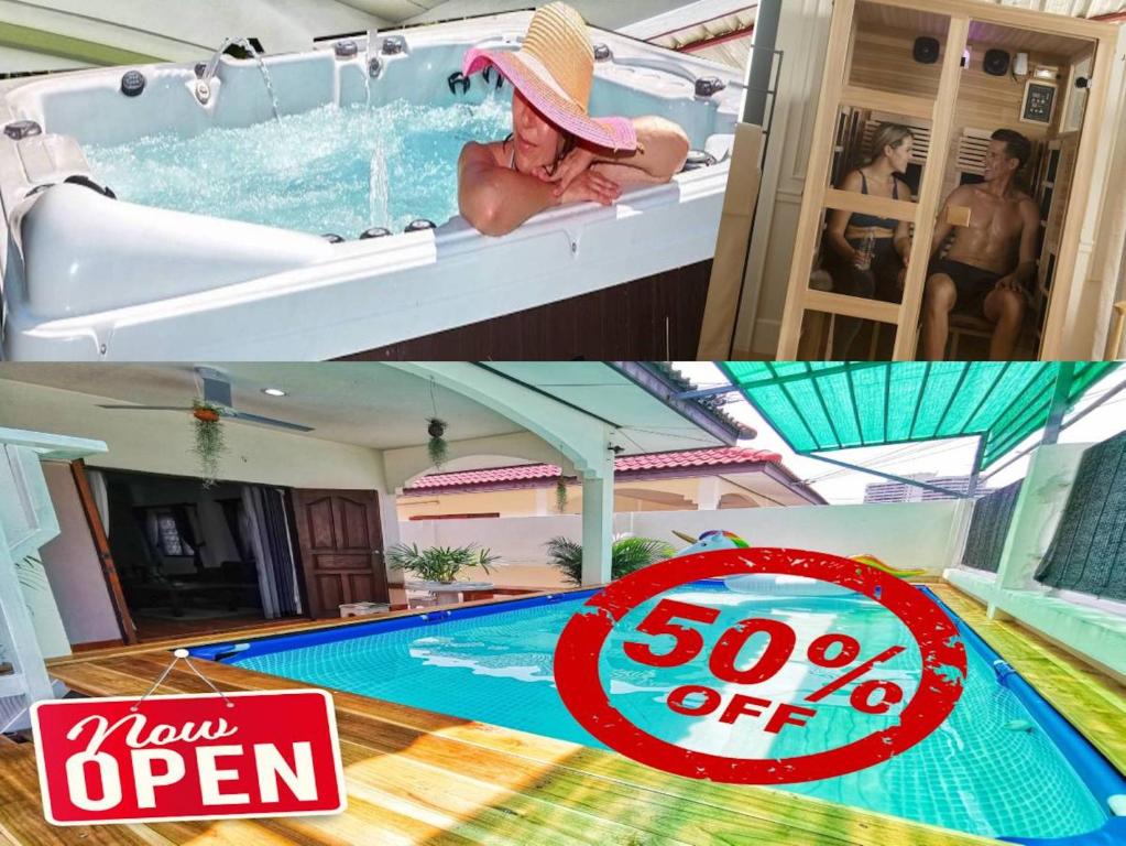 a picture of a man in a swimming pool with a sale sign at Thai Orange Villas in Jomtien Beach