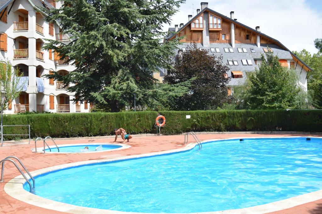 Bazén v ubytování Acogedor apartamento con piscina compartida y opción a parking nebo v jeho okolí