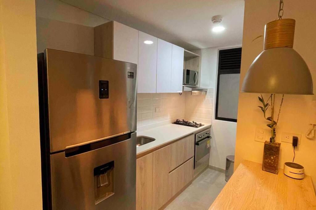 Kuchyň nebo kuchyňský kout v ubytování Cómodo apartamento con excelente ubicación