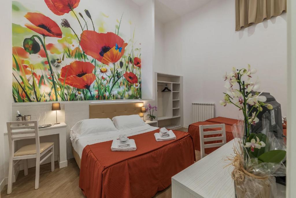 Postel nebo postele na pokoji v ubytování Hotel Mimosa Pantheon