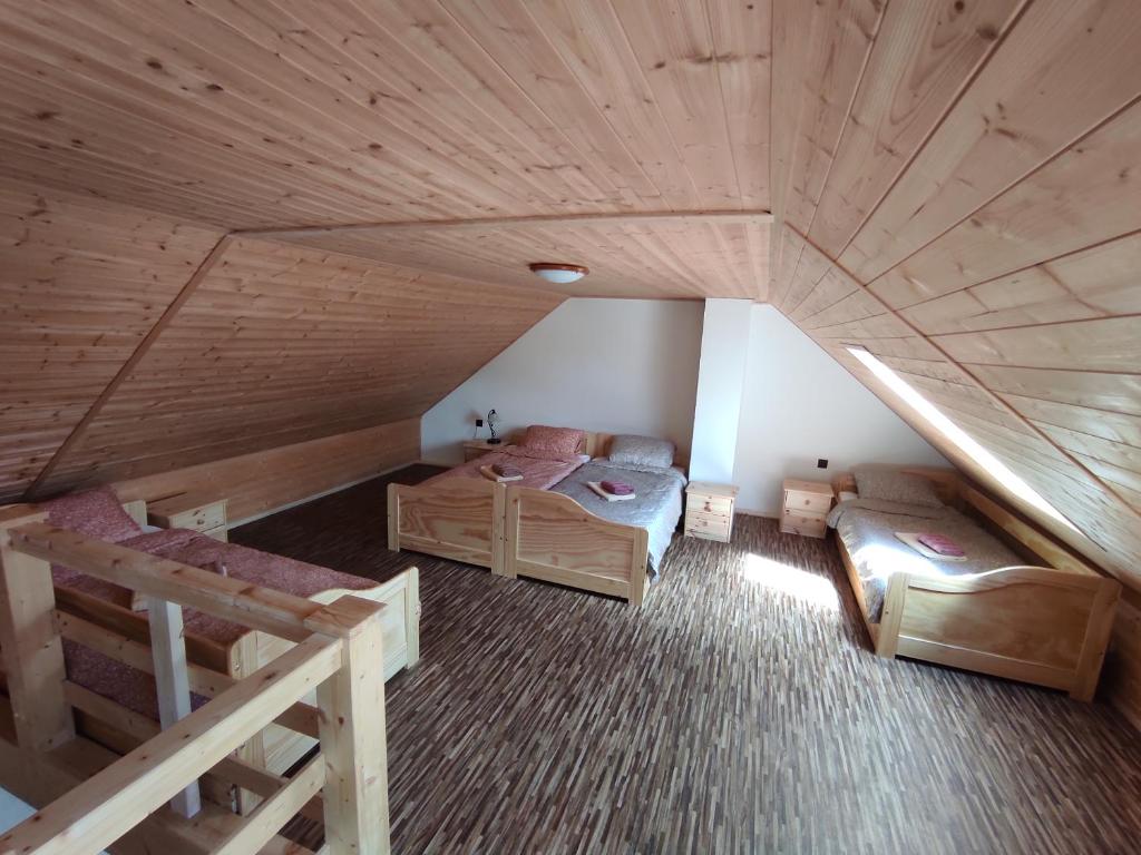 Postel nebo postele na pokoji v ubytování Statek Tomandlov