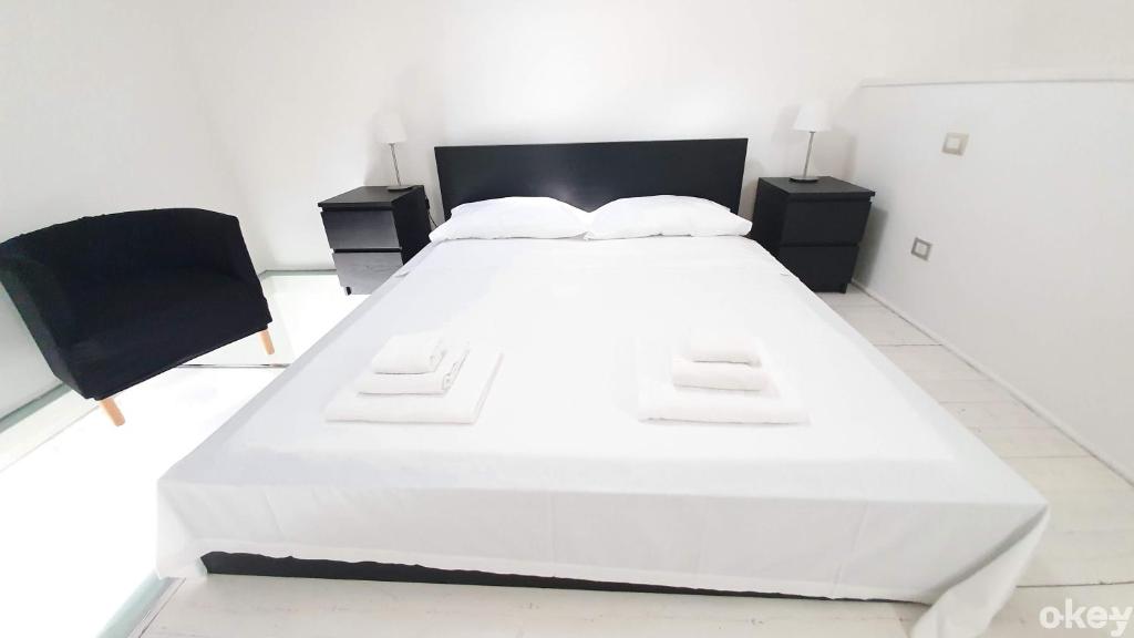 Posteľ alebo postele v izbe v ubytovaní Urban Cottage - Casa Vacanze Bari