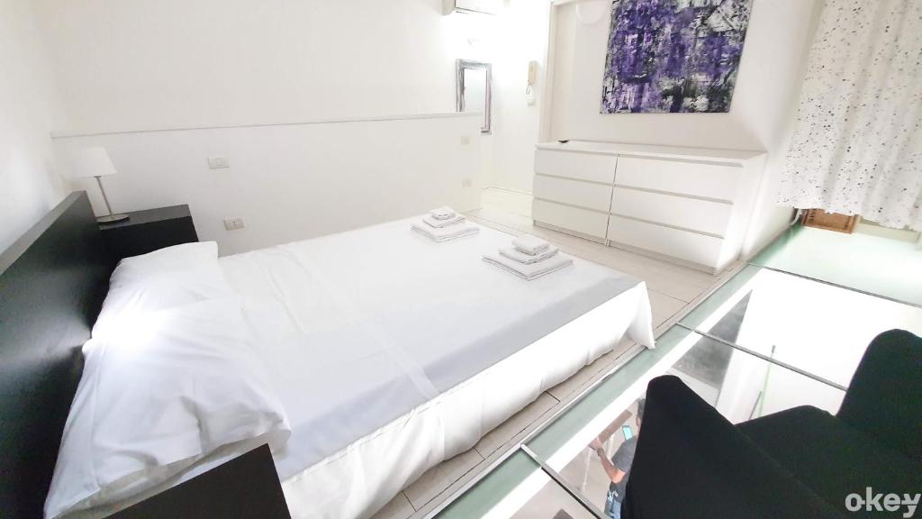 Posteľ alebo postele v izbe v ubytovaní Urban Cottage - Casa Vacanze Bari