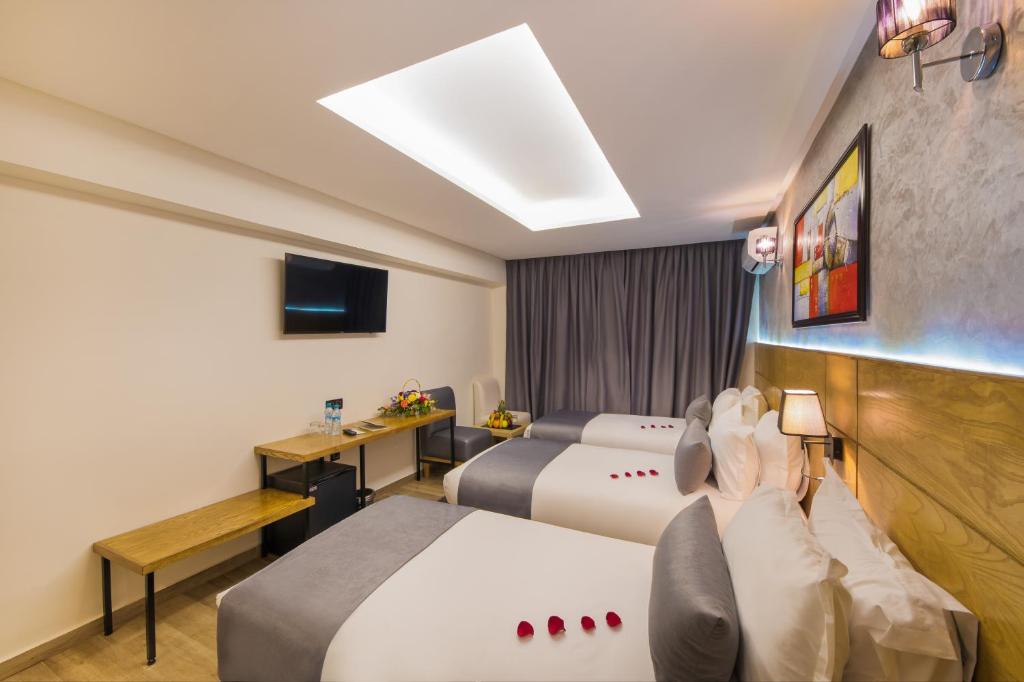Postel nebo postele na pokoji v ubytování Stars Hotel & Spa