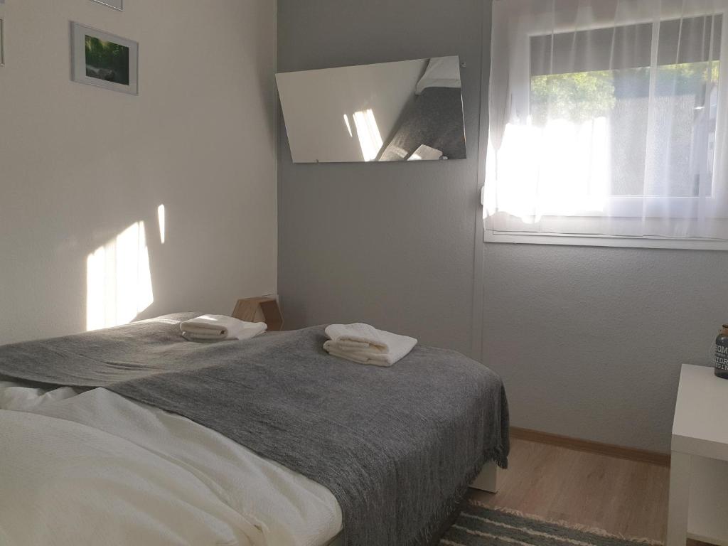 Posteľ alebo postele v izbe v ubytovaní Amica Vendégház
