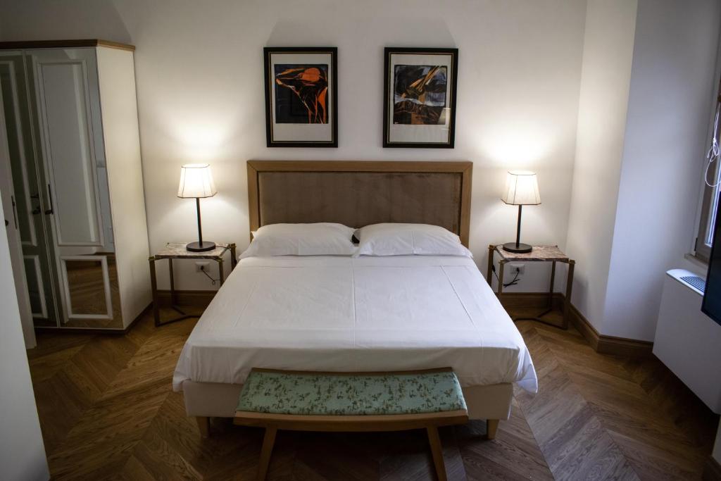 Postel nebo postele na pokoji v ubytování RESIDENZA BALIOS