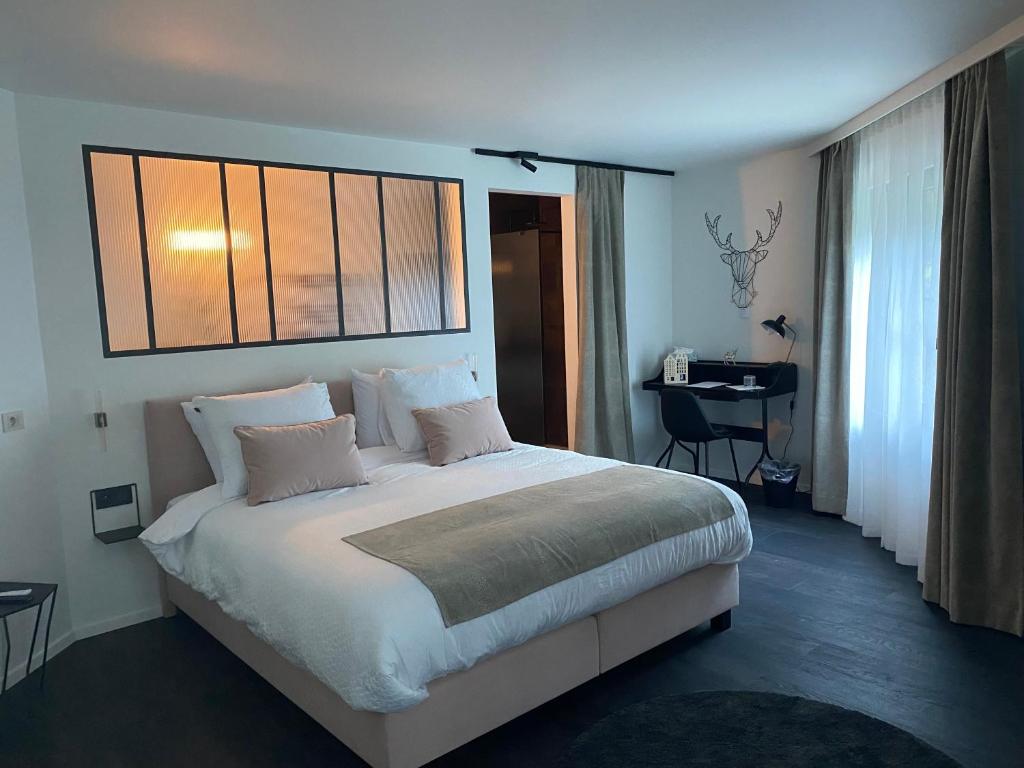 Postel nebo postele na pokoji v ubytování B&B Miranoza