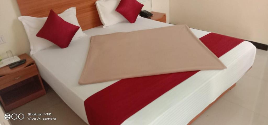Postel nebo postele na pokoji v ubytování Red Star Holidays