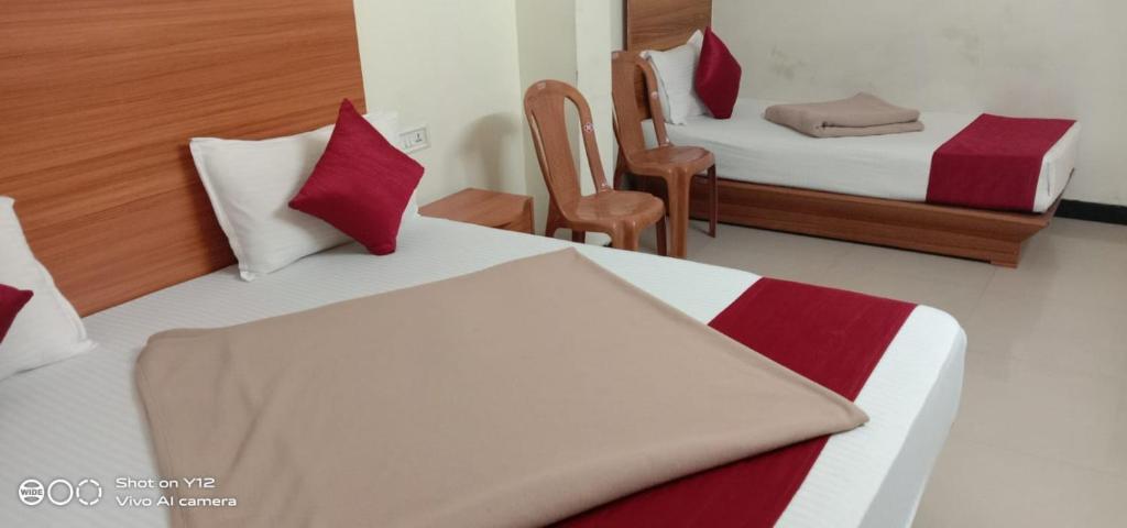 Postel nebo postele na pokoji v ubytování Red Star Holidays