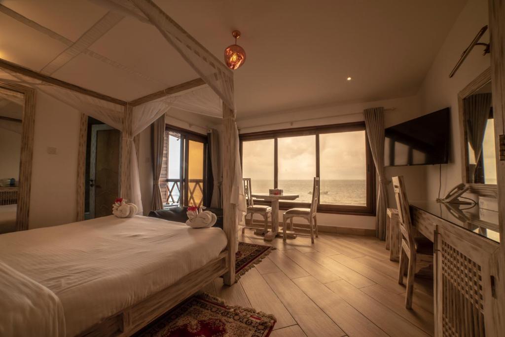 Postel nebo postele na pokoji v ubytování Jumeirah Beachfront