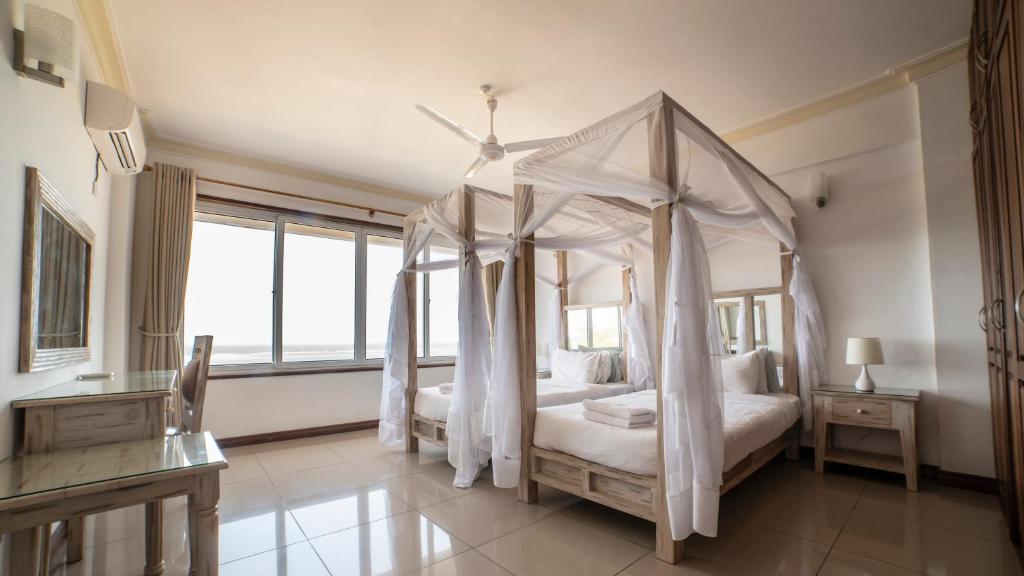Postel nebo postele na pokoji v ubytování Jumeirah Beachfront