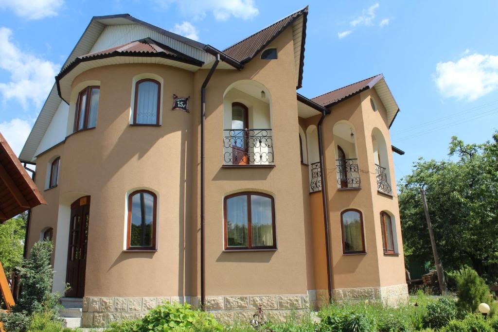 a large house with at Cottage Gutsulia in Yaremche