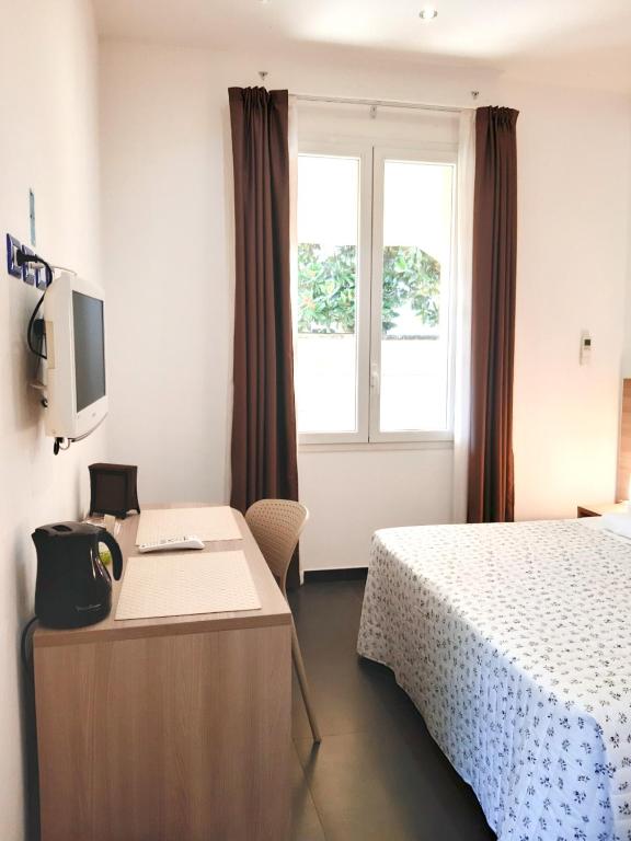 Postel nebo postele na pokoji v ubytování RipamontiBnB