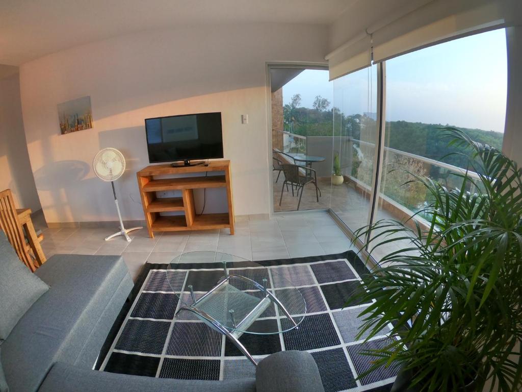 TV a/nebo společenská místnost v ubytování Boca PentHouses - Tampiquera