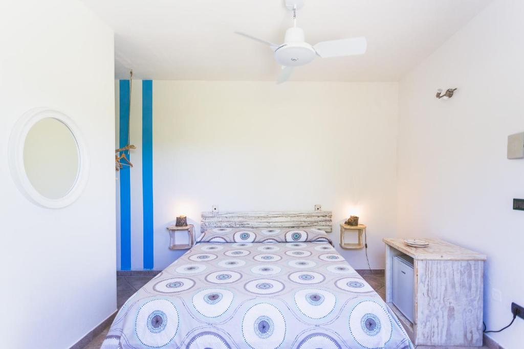 Postel nebo postele na pokoji v ubytování Bio Agriturismo Salos