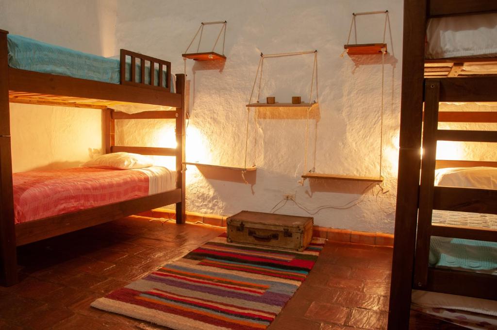 Letto o letti in una camera di Nacuma Garden Hostel - Casa Nacuma