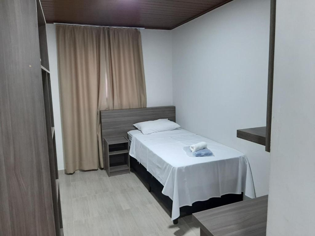 Postel nebo postele na pokoji v ubytování Hotel ROF
