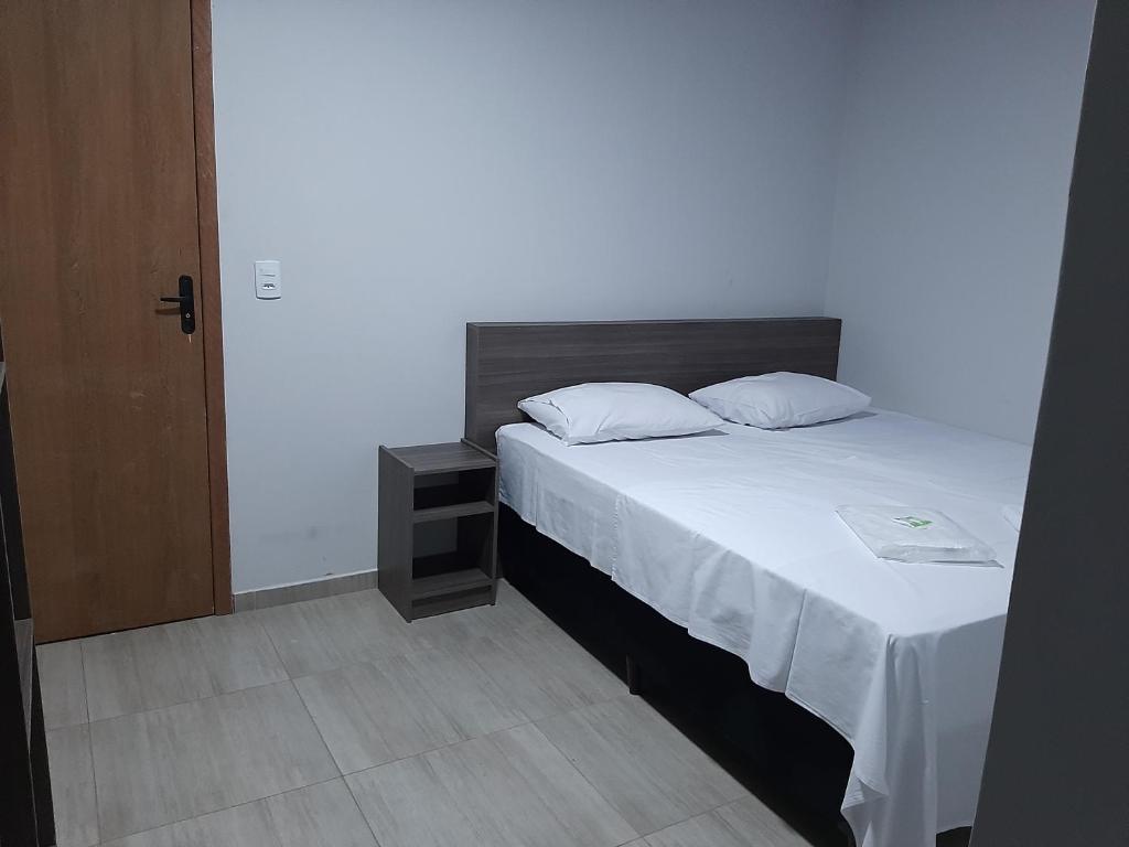 Postel nebo postele na pokoji v ubytování Hotel ROF