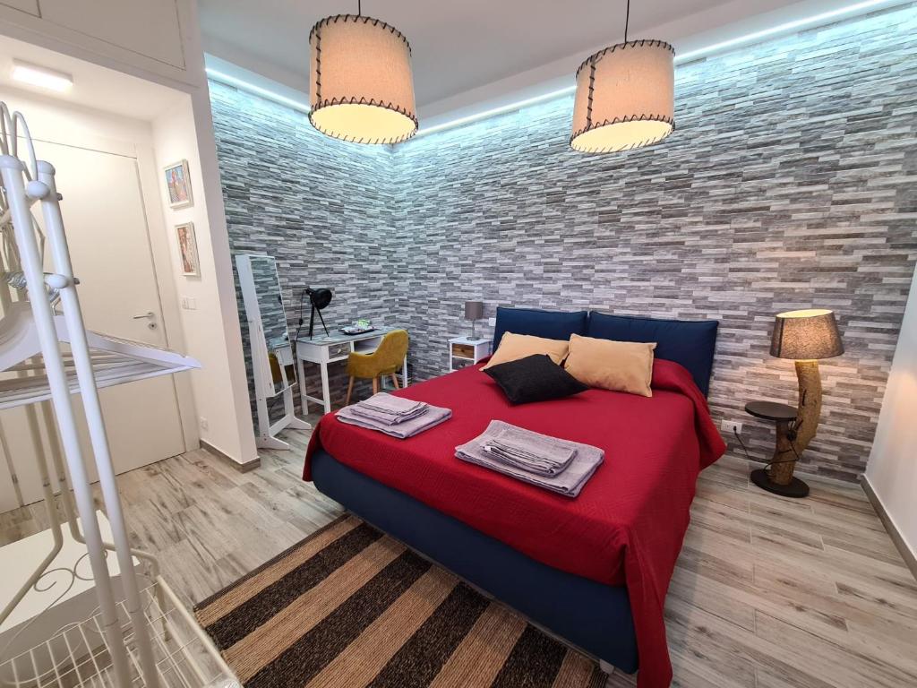 Posteľ alebo postele v izbe v ubytovaní Le Dimore del Gufo B&B and Apartments Suite