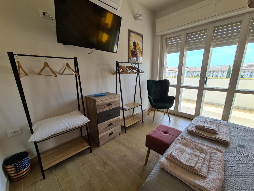 Posteľ alebo postele v izbe v ubytovaní Le Dimore del Gufo B&B and Apartments Suite