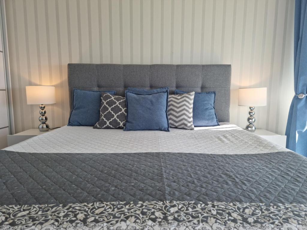 Posteľ alebo postele v izbe v ubytovaní Best Silver Apartman
