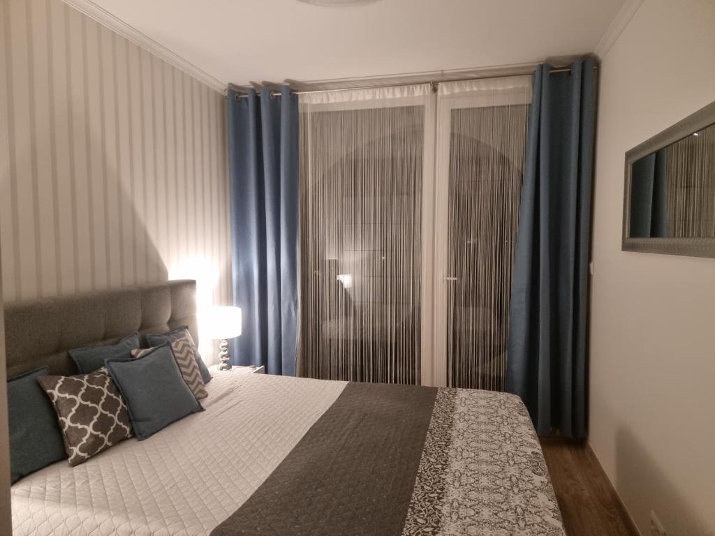 Posteľ alebo postele v izbe v ubytovaní Best Silver Apartman