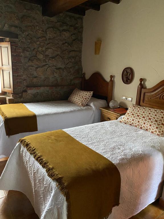 Postel nebo postele na pokoji v ubytování Hotel Alda
