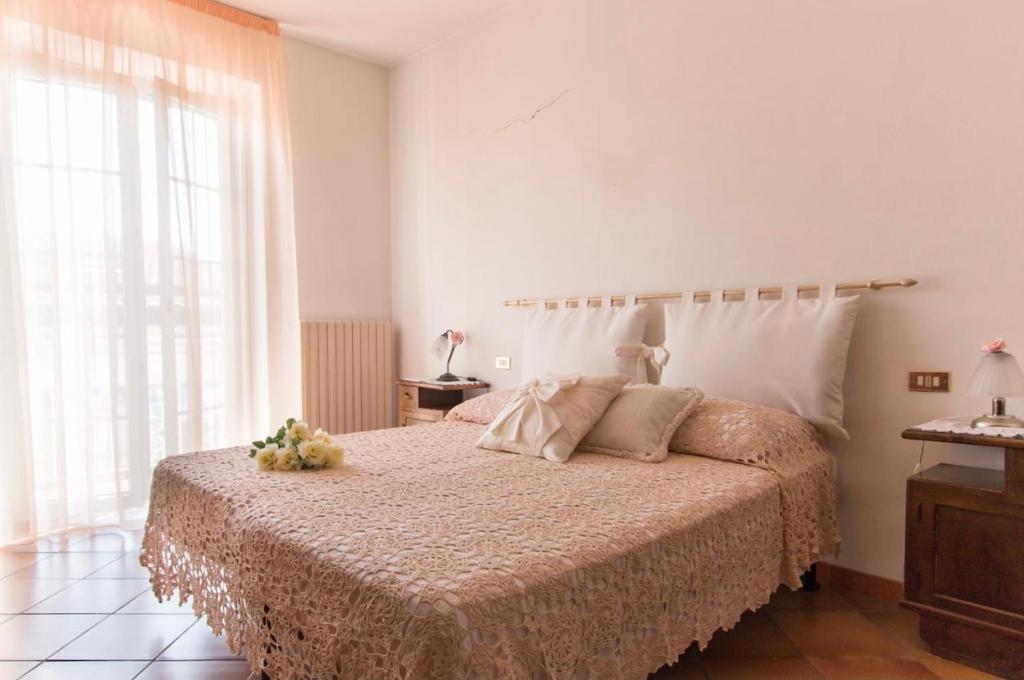 Łóżko lub łóżka w pokoju w obiekcie Splendida e incantevole casa a due passi dal mare