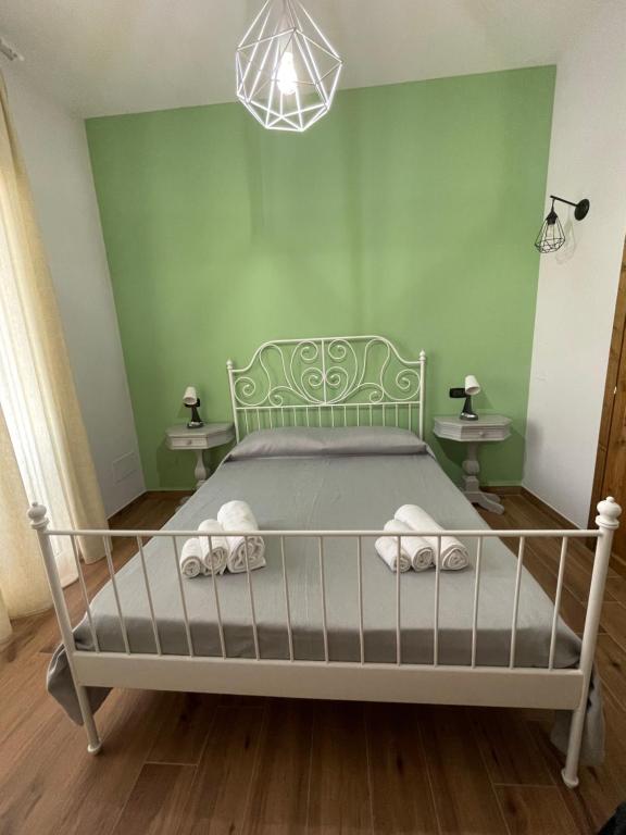 Ein Bett oder Betten in einem Zimmer der Unterkunft Reginella b&b