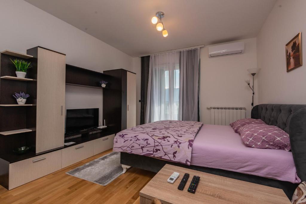 Postel nebo postele na pokoji v ubytování Elite One Premium Apartment
