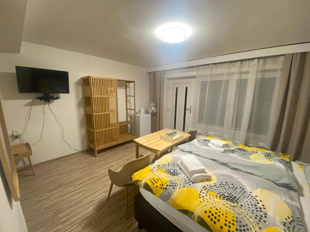Postel nebo postele na pokoji v ubytování Penzión Oáza