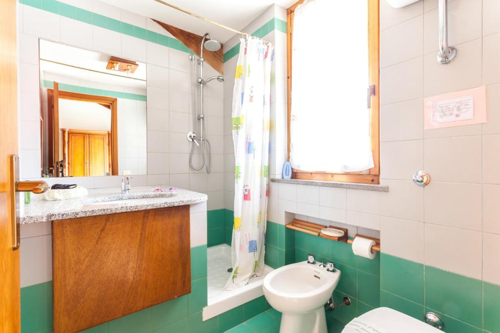 Koupelna v ubytování Agriturismo Cavendo Tutus