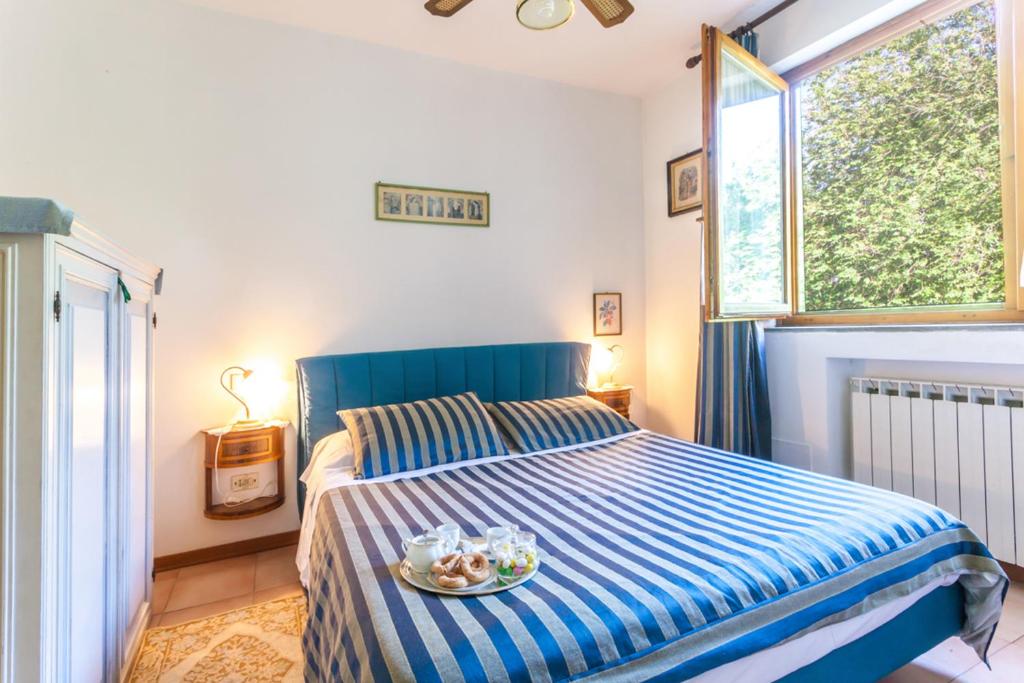 Postel nebo postele na pokoji v ubytování Agriturismo Cavendo Tutus